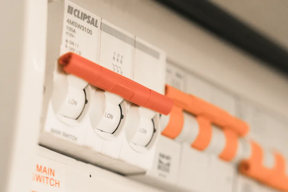 The main switch and circuit breakers inside an Australian home switchboard
